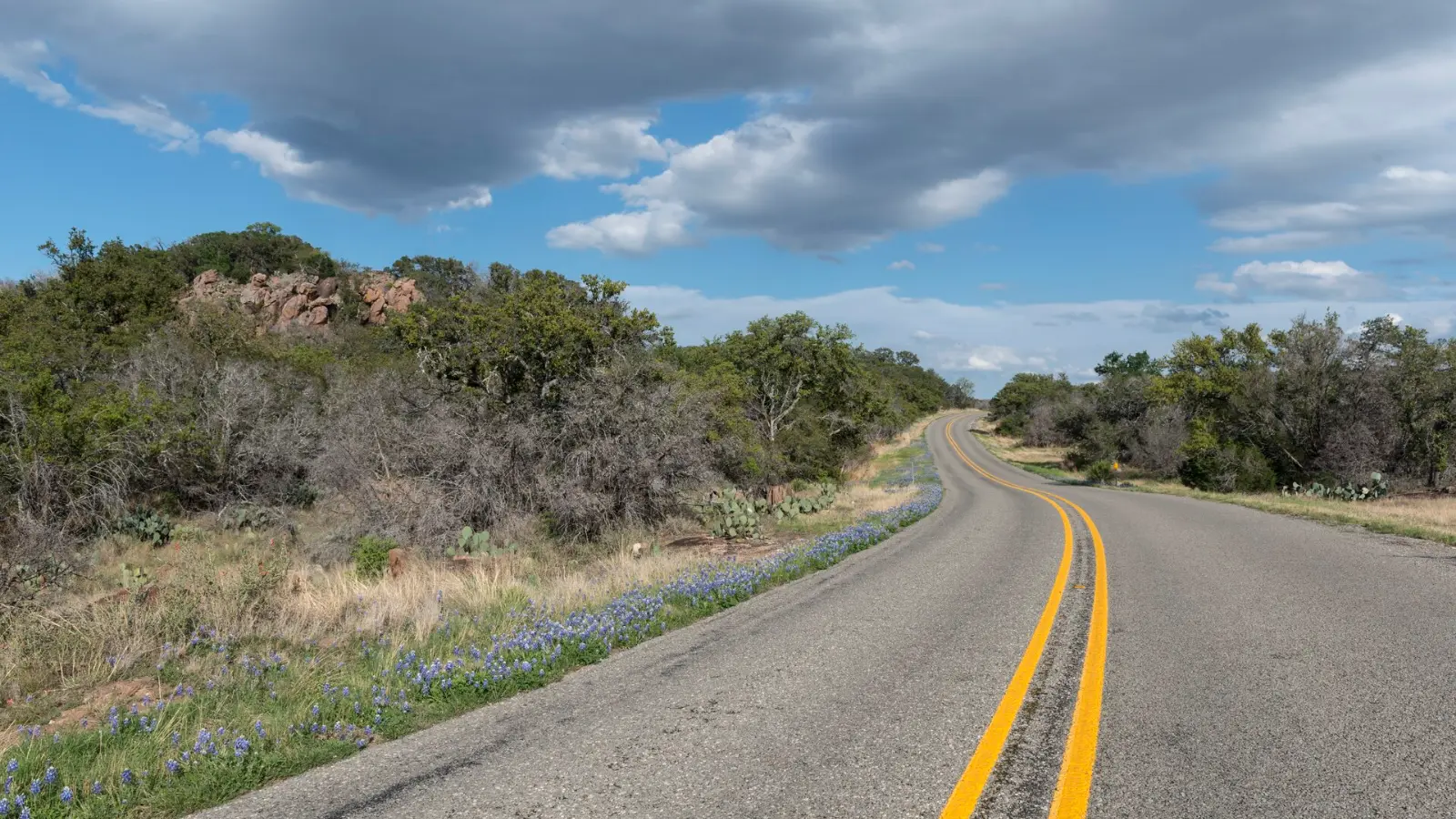 A two-lane road through the Texas Hill Country near Burnet